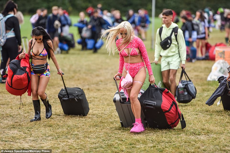 The mercury is set to hit 71F (21.6C) this weekend with a mixture of sunny and cloudy conditions forecast, according to the Met Office. Pictured: revellers arriving at Leeds Festival this morning
