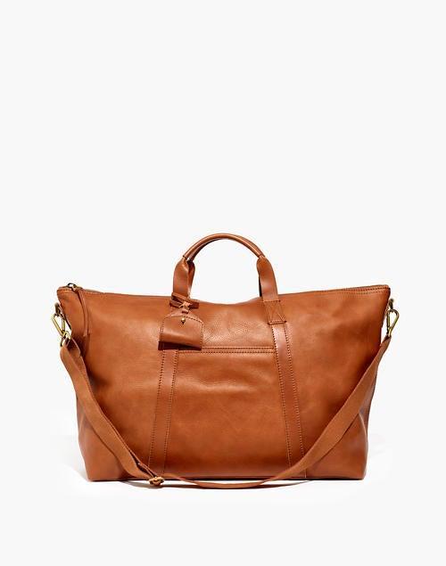 <h2>Madewell Essential Overnight Bag <br></h2><br>This stylish overnight bag is estimated to ship by early October, but according to reviews, it's worth the wait. One happy customer says, "The leather is buttery and soft and the inside is super roomy... [I] plan on using this to bring a week full of clothes [and] I know I can fit it all. And, an extra bonus is that there are metal gold footbeds at the bottom of the bag which isn’t listed in the description!"<br><br><em>Shop <a href="https://www.madewell.com/the-essential-overnight-bag-in-leather-L4359.html" rel="nofollow noopener" target="_blank" data-ylk="slk:Madewell" class="link rapid-noclick-resp"><strong>Madewell</strong></a></em><br><br><strong>Madewell</strong> The Essential Overnight Bag in Leather, $, available at <a href="https://go.skimresources.com/?id=30283X879131&url=https%3A%2F%2Fwww.madewell.com%2Fthe-essential-overnight-bag-in-leather-L4359.html" rel="nofollow noopener" target="_blank" data-ylk="slk:Madewell" class="link rapid-noclick-resp">Madewell</a>