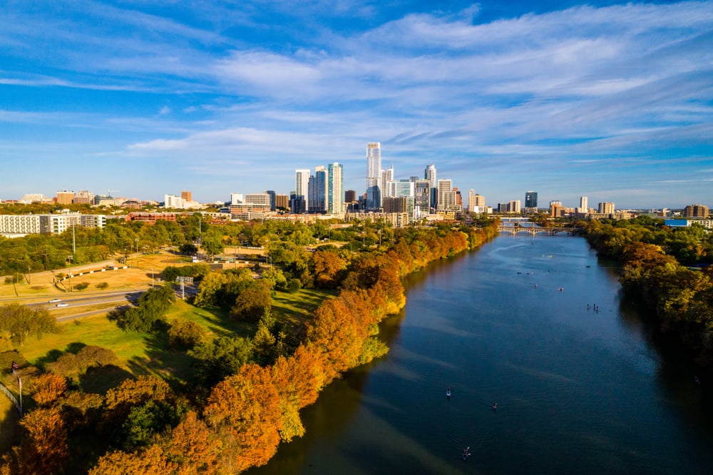 colorful leaves change along lady bird lake on waters edge of Austin , Texas