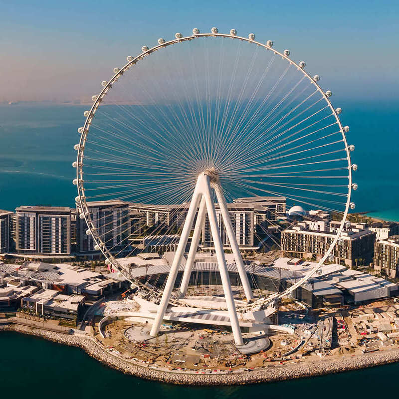 Aerial View Of Dubai Ferris Wheel, Located On A Manmade Peninsula Stretching Out From The Mainland, United Arab Emirates, Middle East